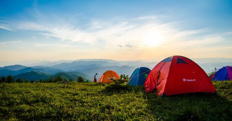 Camping - Photo of Pitched Dome Tents Overlooking Mountain Ranges