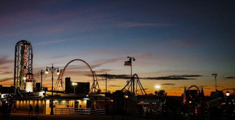 Theme Parks - silhouette of carnival during golden hour
