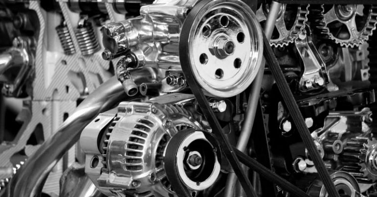 Gear - Greyscale Photography of Car Engine
